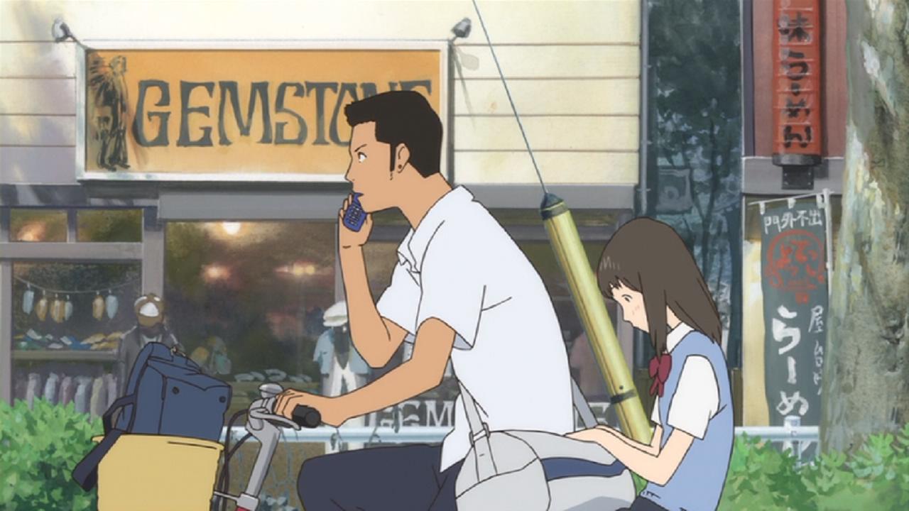 功介和果穗骑车经过的服装店